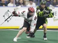 Vancouver Stealth forward Rhys Duch goes to move the ball past Saskatchewan Rush defender Ryan Dilks at SaskTel Centre in Saskatoon on March 3.