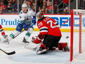 Jake Virtanen rings one off the post in the third period.