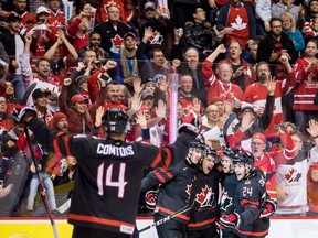 Canada's Maxime Comtois, front left, and Brett Leason, back left to right, Nick Suzuki, Morgan Frost and Ty Smith celebrate Frost's goal against the Czech Republic during third period IIHF world junior hockey championship action in Vancouver, on Saturday December 29, 2018.