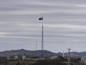 A North Korean flag flutters in the wind atop a 160-meter tower in North Korea's village Gijungdongseen, as seen from the Taesungdong freedom village inside the demilitarized zone in Paju, South Korea, Tuesday, April 24, 2018. Internal memos show Canadian officials have been quietly preparing for the fallout from a possible atmospheric nuclear weapons test by North Korea, including the spread of radioactive debris across the ocean and the major public concerns that would arise.