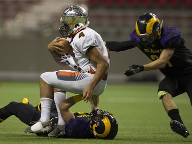 VANCOUVER December 01 2018.    Mount Douglas Rams #8 Sebastian Hansen pulls down New Westminster Hyacks #4 Kinsale Phillip in the AAA final of the BC high school football championships at the Subway Bowl 2018, BC Place, Vancouver,  December 01 2018.   Gerry Kahrmann  /  PNG staff photo) 00055454B [PNG Merlin Archive]
