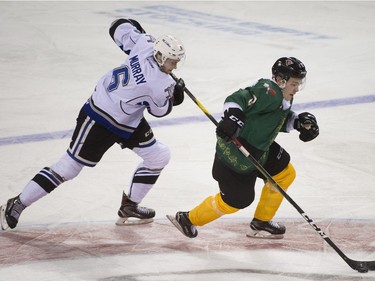 Vancouver Giants #8Tristen Nielsen keeps the puck from  Victoria Royals #6 Jameson Murrayin a regular season WHL hockey game at the Pacific Coliseum, Vancouver,  December 08 2018.