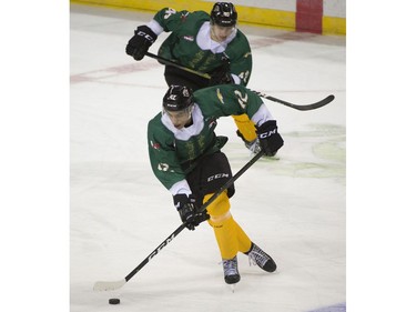 Vancouver Giants #40 Milos Roman and #42 Justin Sourdif  dressed as Buddy the Elf skate against the Victoria Royals in a regular season WHL hockey game at the Pacific Coliseum, Vancouver,  December 08 2018.