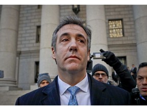 In this Nov. 29, 2018, file photo, Michael Cohen walks out of federal court in New York.