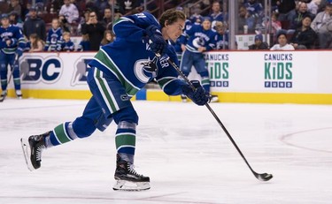Loui Eriksson #21 of the Vancouver Canucks shoots the puck while competing in the accuracy contest during the Vancouver Canucks Super Skills Contest at Rogers Arena in Vancouver, BC, December, 2, 2018.