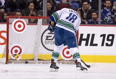 Jake Virtanen #18 of the Vancouver Canucks shatters a target while competing in the accuracy contest during the Vancouver Canucks Super Skills Contest at Rogers Arena in Vancouver, BC, December, 2, 2018.