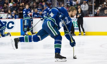 Alexander Edler #23 of the Vancouver Canucks competes in the hardest shot contest during the Vancouver Canucks Super Skills Contest at Rogers Arena in Vancouver, BC, December, 2, 2018.