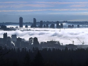 The Vancouver skyline seen through the clouds from West Vancouver on December 2, 2018. This is a nicely layered photo taken from one of my favourite early morning locations at the Viewpoint on Cypress Bowl Road. It was taken with a 200mm lens at f9 and 1/3200s at ISO 320.