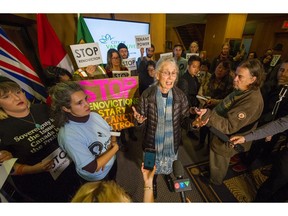 Coun. Jean Swanson speaks as hundreds attend a rally against renovictions before a council vote at Vancouver City on Dec. 4.