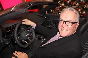 At the Richmond Christmas Fund benefit, David Newman of Richmond Signarama checked out the line up of luxury cars between tasty bites and generous bidding.