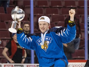 Toni Utunen of Finland celebrates with the championship trophy after defeating the United States 3-2 in the Gold Medal game of the 2019 IIHF World Junior Championship on January, 5, 2019 at Rogers Arena in Vancouver, British Columbia, Canada.