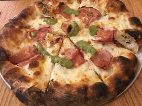 Pistacchio e mortadella pizza at Mangia Cecina and Bar on Manitoba Street in Vancouver. Mia Stainsby photo.