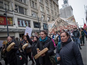 Protesters march in support of pipeline protesters in northwestern British Columbia, in Vancouver, on Tuesday January 8, 2019. Fourteen people were taken into custody Monday at a blockade southwest of Houston, B.C., where members of the Gidimt'en clan of the Wet'suwet'en First Nation had set up a camp to control access to a pipeline project across their territory.