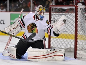 Michael Leighton, veteran of 111 NHL games, is going to tend nets for the Utica Comets.