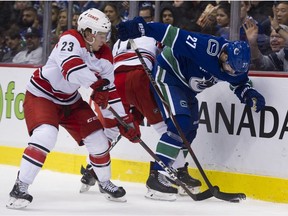 Ben Hutton is hounded by Brock McGinn and  Lucas Wallmark on  Wednesday.