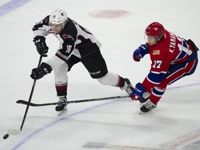 Davis Koch of the Vancouver Giants, left, has become a leader on his Langley-based team. With his sights set on the pros, he wants to finish his WHL career by helping the Giants become title contenders.