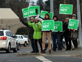 Supporters gather with Green party candidate Michele Ney (centre) in Nanaimo on election day.