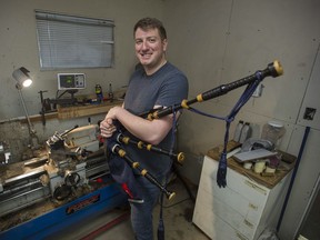 Andrew Lee from Lee and Sons Bagpipes at work in his shop building bagpipe components. Lee and his father build the pipes for clients around the world from their shop in Surrey.