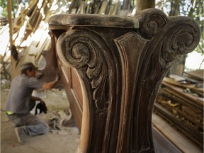 A worker varnishes a pew that will be used by pilgrims during Mass on World Youths Day, to be celebrated by Pope Francis, at Hernan Guardia's carpentry workshop where the Pope's chair is also being built in Los Pozos, Panama, Saturday, Jan. 12, 2019. The Argentine pontiff visit Panama Jan. 23-27.