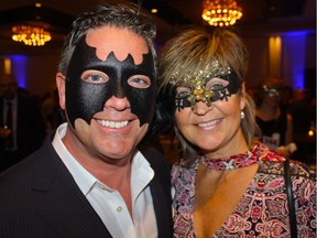 Gary Leseur and Pam Vidalin were among 300 masqueraders who filled the Hyatt Regency Ballroom for the Mission Possible fundraiser.