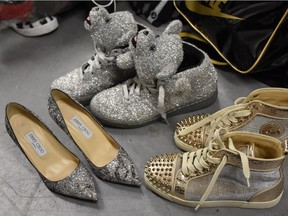 A man has been arrested and charged in connection to four storage lockers and one home where stolen luxury goods – such as Jimmy Choo shoes and high-end purses – were found.