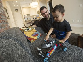 Matt Astifan and his son Marcus in their New Westminster condo.