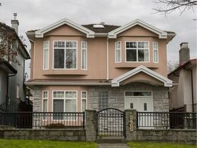 A home on East 5th Ave. in Vancouver belonging to Stephen Hai Peng Chen, also known as Hoy Pang Chan.