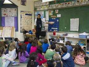 A teacher instructs her class at Hastings Elementary School in East Vancouver in this file photo from 2014.