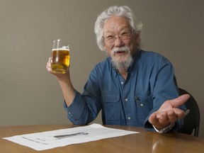 David Suzuki toasts a copy of his 1968 piece "What this campus needs is a pub."