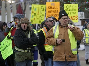 Supporters at the National Citizens Alliance Public Rally on Canadian Nationalism vs Globalism at Churchill Sqaure in downtown Edmonton on Saturday January 5, 2019.