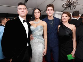 Dua Lipa, Isaac Carew and guests attend the 61st Annual GRAMMY Awards at Staples Center on February 10, 2019 in Los Angeles, California.