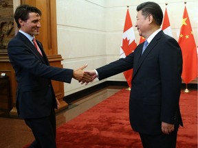 Chinese President Xi Jinping (R) shakes hands with Canadian Premier Justin Trudeau ahead of their meeting at the Diaoyutai State Guesthouse in Beijing, China, 31 August 2016.