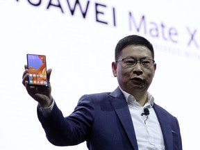 Richard Yu, the CEO of Huawei's consumer products division presents the new Huawei Mate X foldable smartphone at the Mobile World Congress (MWC), on the eve of the world's biggest mobile fair, on Feb. 24, 2019 in Barcelona. (JOSEP LAGO/AFP/Getty Images)