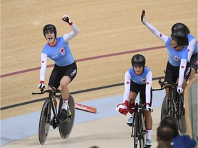 Georgia Simmerling (far left) and her teammates celebrate after finishing their women’s team pursuit final in track cycling at the 2016 Summer Olympics in Rio de Janeiro, Brazil in August 2016. The Canadian quartet was awarded with a bronze medal.
