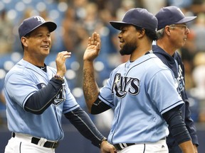 Charlie Montoyo (left) congratulating closer Alex Colome following a Tampa Bay victory, says he will bring to Toronto some of the forward thinking that has made the Rays so interesting to watch the past few seasons. He’ll also embrace the analytical approach favoured by GM Ross Atkins and team president Mark Shapiro.
