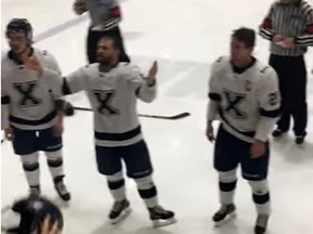 St. Francis Xavier players taunt the Acadia bench during a brawl Saturday. (Video screen grab)