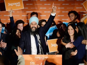 NDP leader Jagmeet Singh celebrates his Burnaby South byelection win as he arrives at his election night party in Burnaby, B.C., Monday, Feb. 25, 2019.