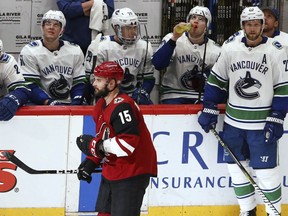 Brad Richardson skates past the Vancouver Canucks bench after scoring his fourth goal of the night.