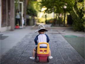 FILE PHOTO: A young boy plays at a daycare, in Langley.
