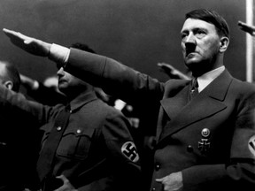 A picture dated 1939 shows German Nazi Chancellor Adolf Hitler giving the nazi salute during a rally next to "Deputy Furhrer" Rudolf Hess.