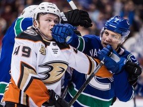 Former minor-league teammates Max Jones and Luke Schenn (right) get reunited during a Feb. 25, 2019 NHL game at Rogers Arena.