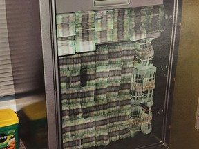 Bundles of $20 bills seized in October 2015 as part of RCMP E-Pirate investigation into money laundering at alleged underground Richmond bank, Silver International.