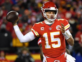 Patrick Mahomes of the Kansas City Chiefs looks to pass against the New England Patriots during the AFC Championship game at Arrowhead Stadium on January 20, 2019 in Kansas City. (Peter Aiken/Getty Images)
