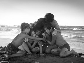 Yalitza Aparicio, center, in a scene from the film Roma.