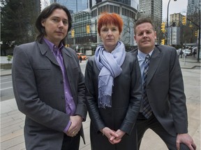 Ryan Bruce of the Christian Labour Association of Canada, Fiona Famulak of the Vancouver Regional Construction Association and Rieghardt van Enter of the Progressive Contractors Association outside B.C. Supreme Court in Vancouver on Wednesday, where they opposed the provincial government’s labour agreement on building public infrastructure projects.