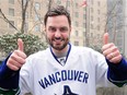 Drew Forester, who In 2005 quit his job in England, got a 12-month work visa and moved to Vancouver with hopes of watching a full season of the Vancouver Canucks, only to find that the NHL was locked out and he didn't get to see a single Canucks game, is seen in Vancouver on Feb 10.