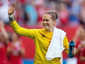 Canada goalkeeper Erin McLeod waves to fans after defeating Switzerland 1-0 in a FIFA Women's World Cup round of 16 soccer match in Vancouver on June 21, 2015. Canadian international goalkeeper McLeod is joining Manchester United's Juan Mata, Juventus' Giorgio Chiellini, U.S. international Alex Morgan and other soccer stars in digging into their pockets to help others.