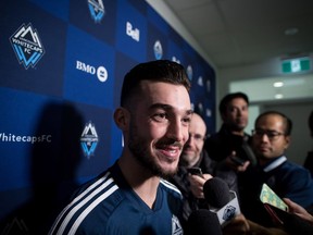 Vancouver Whitecaps midfielder Russell Teibert responds to questions during a media availability ahead of the MLS soccer team's training camp in Vancouver on Jan. 21. Teibert can't wait to get back to training with his Vancouver Whitecaps teammates, even if the field is covered with snow.