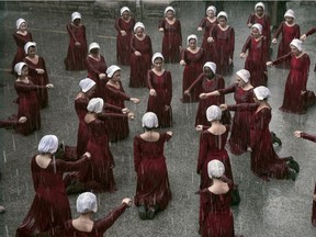 This image released by Hulu shows a scene from the series, "The Handmaid's Tale," returning for a third season on June 5. (George Kraychyk/Hulu via AP) ORG XMIT: NYET100