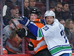 Alex Edler will take the game-day skate Monday and could face the Flyers.
